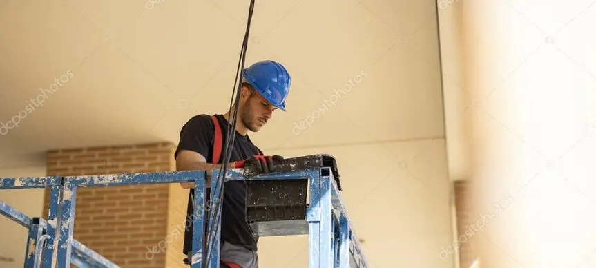 Technician installing access point during rollout
